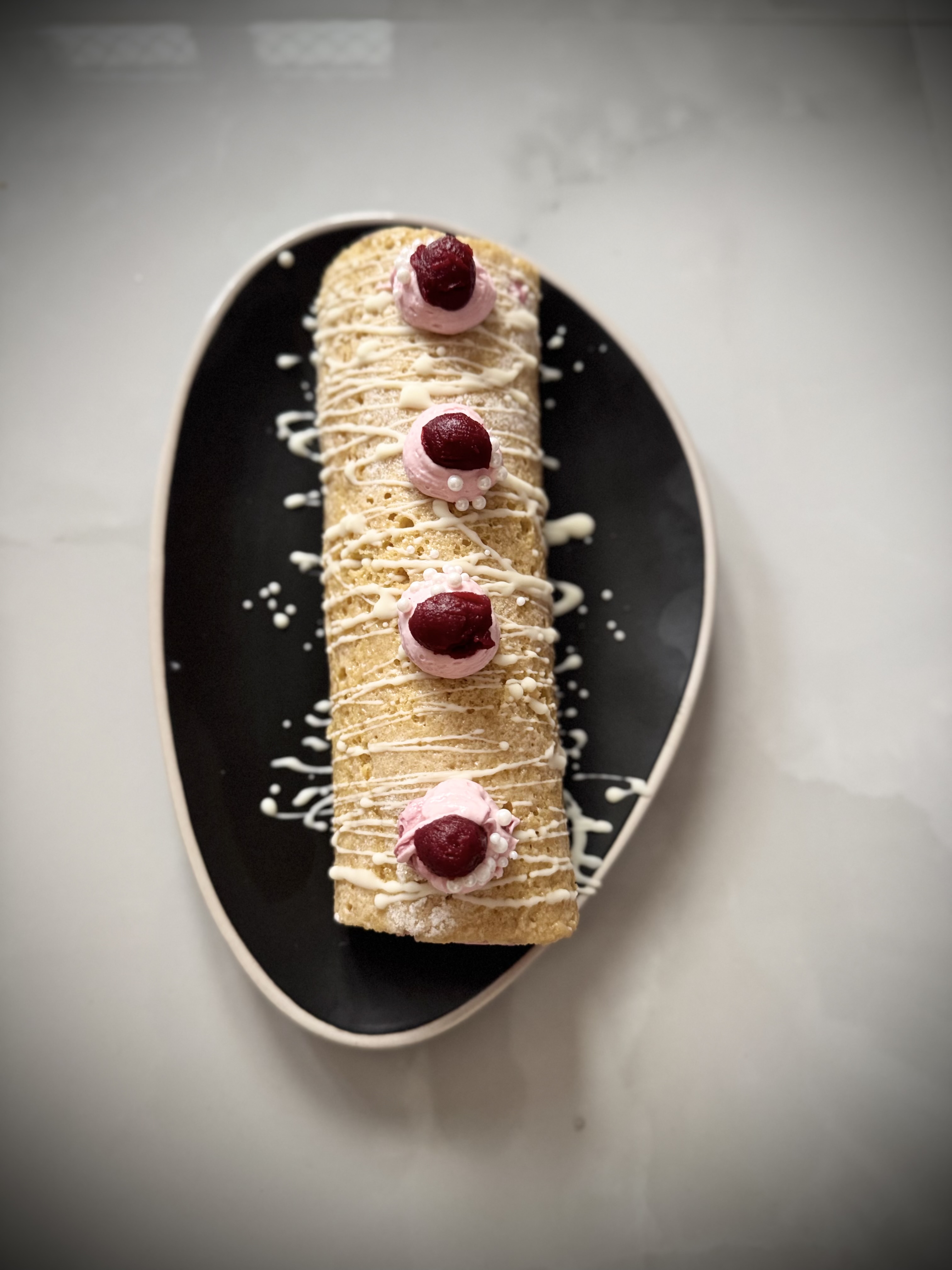 Chocolate log cake with rich decoration